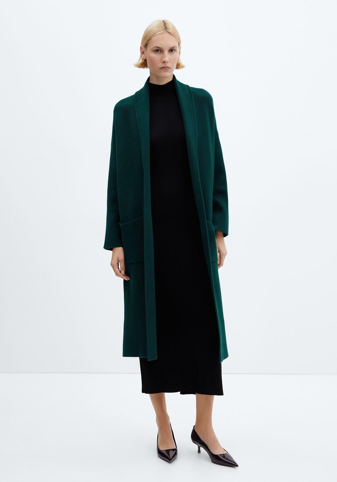 Oversized knitted coat with pockets