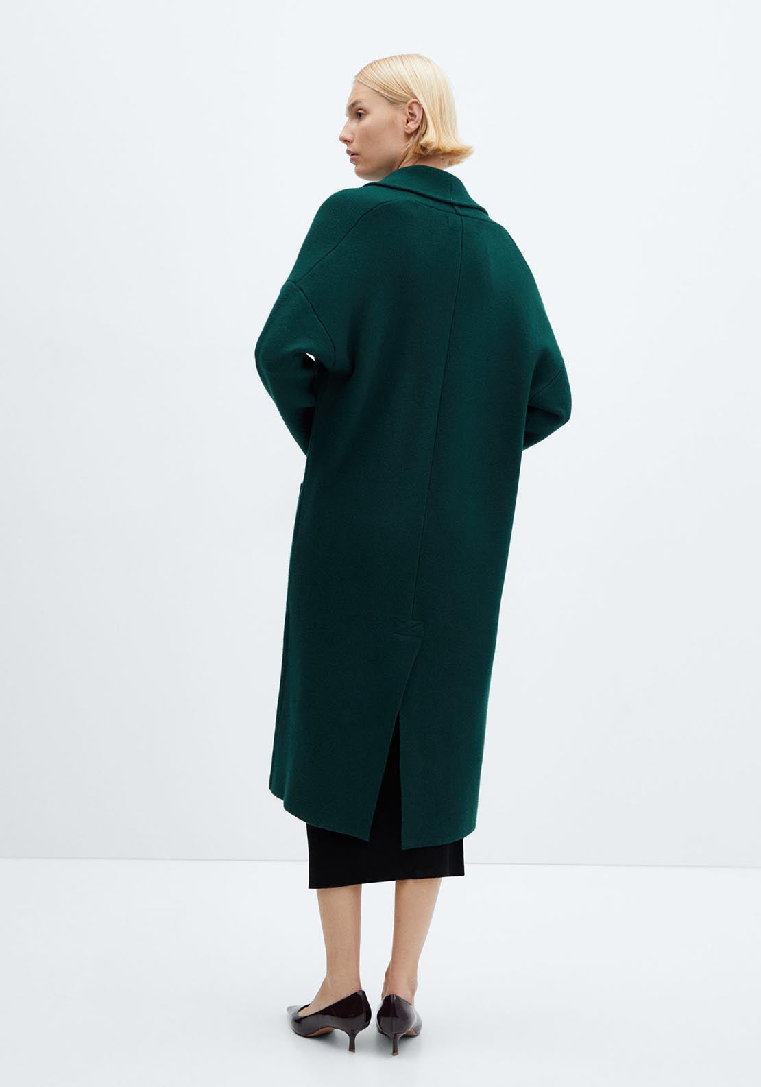 Oversized knitted coat with pockets