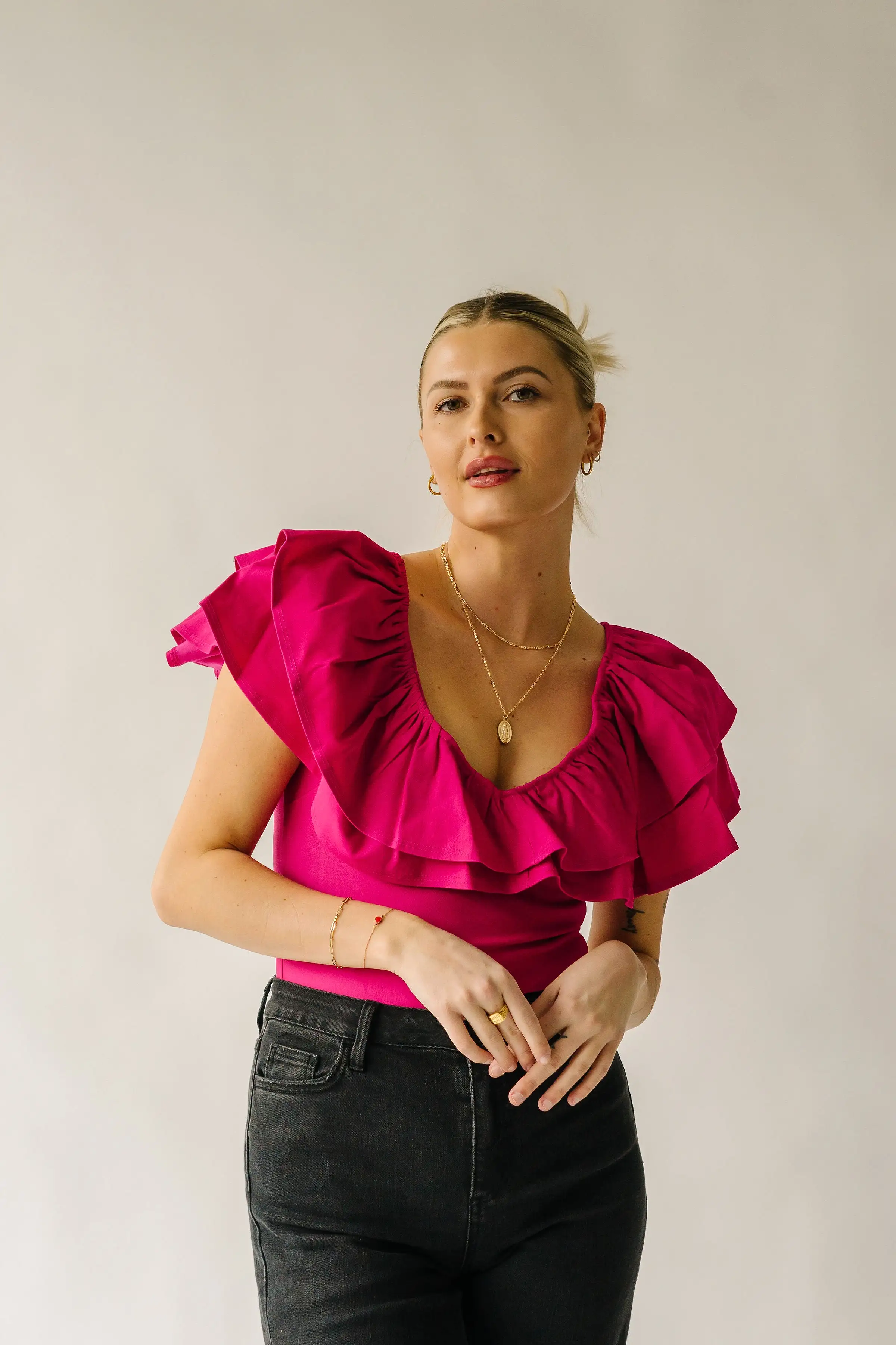 The Pedersen Ruffle Bodysuit in Magenta